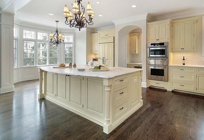 newly installed grey laminate floors in modern kitchen in Medley